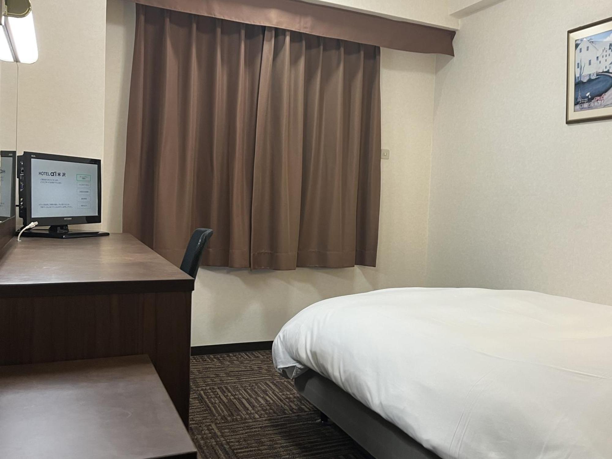 Hotel Alpha-One Йонедзава Номер фото